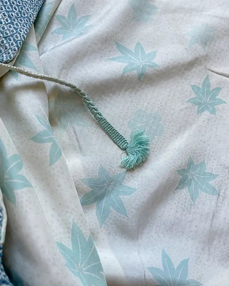 Light blue butterfly-patterned kimono haori jacket lined with autumn leaves pattern