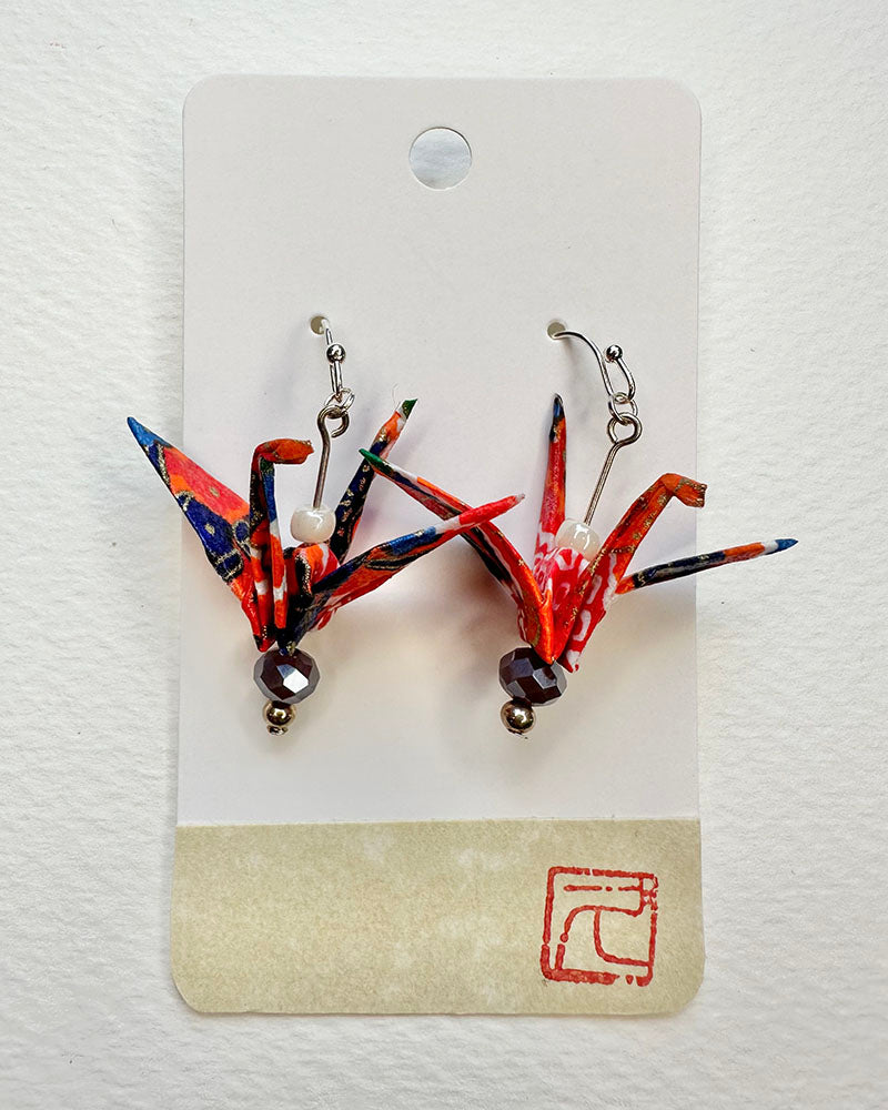 Tropical Textile  Non-Toxic water-based glue & finish. Washi Paper, Vintage Botton, Allergy free Metalic Hand-crafted by Hisao Deldeo SKU: OTJE 006 TsuruEarringsAll earrings are one of a kind.