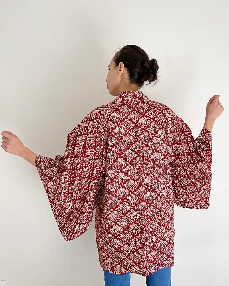 Back side of the red brown haori jacket with rhombic pattern.